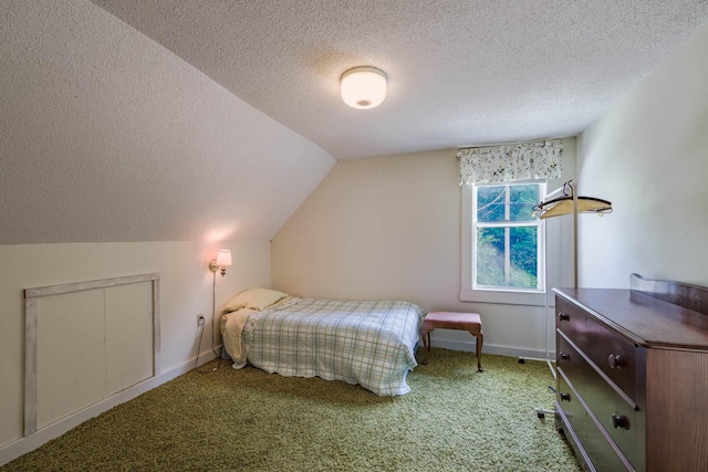 bedroom with carpet, lofted ceiling, a textured ceiling, and baseboards