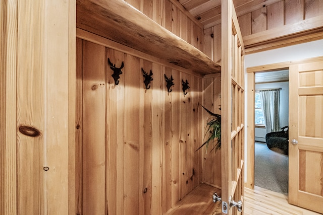 mudroom with light wood-style floors