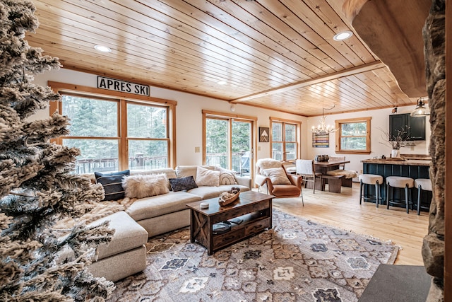 living room featuring recessed lighting, a notable chandelier, wood finished floors, wood ceiling, and crown molding