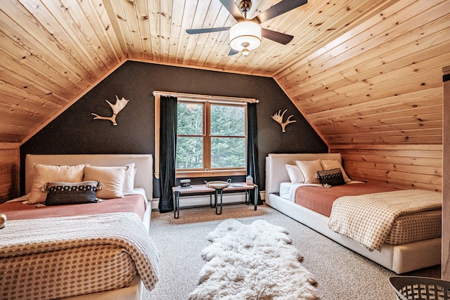 bedroom with lofted ceiling, wood walls, wood ceiling, a ceiling fan, and carpet