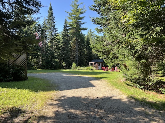 view of road featuring driveway