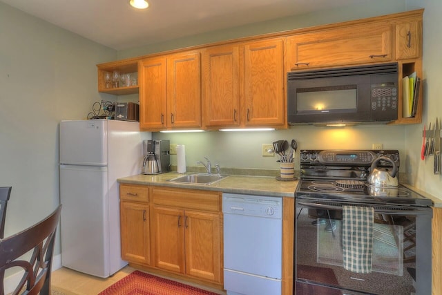 kitchen featuring sink and black appliances