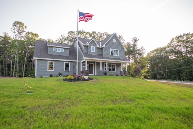 craftsman inspired home featuring a front yard