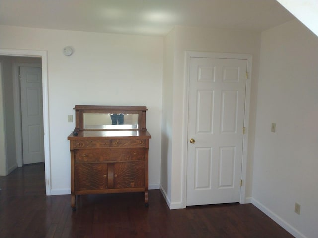 hall featuring dark hardwood / wood-style floors