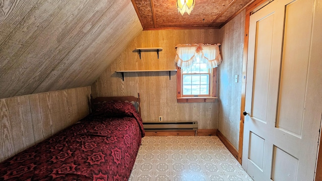 bedroom with lofted ceiling, wood ceiling, wood walls, and baseboard heating