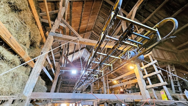 miscellaneous room with lofted ceiling