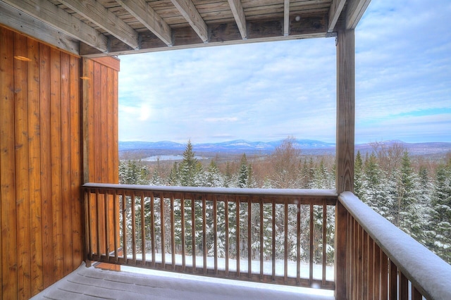 wooden terrace featuring a mountain view