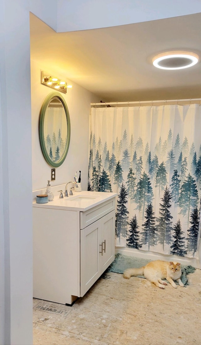 bathroom with vanity with extensive cabinet space