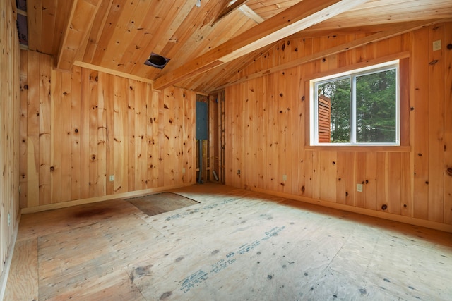 spare room with vaulted ceiling with beams and wooden ceiling