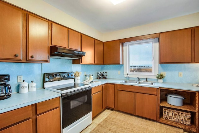 kitchen with electric range and sink