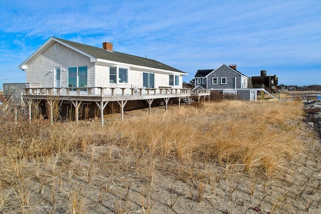 rear view of house with a deck