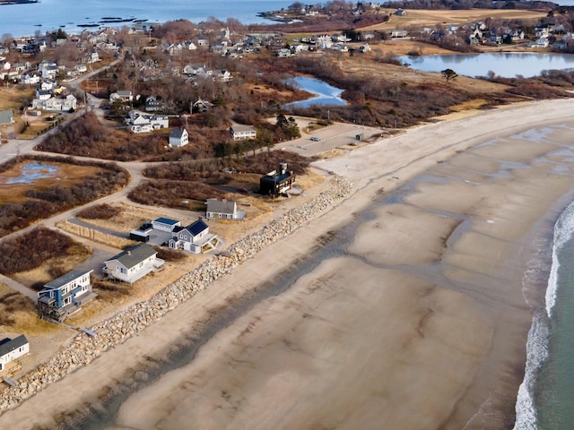 aerial view with a beach view and a water view