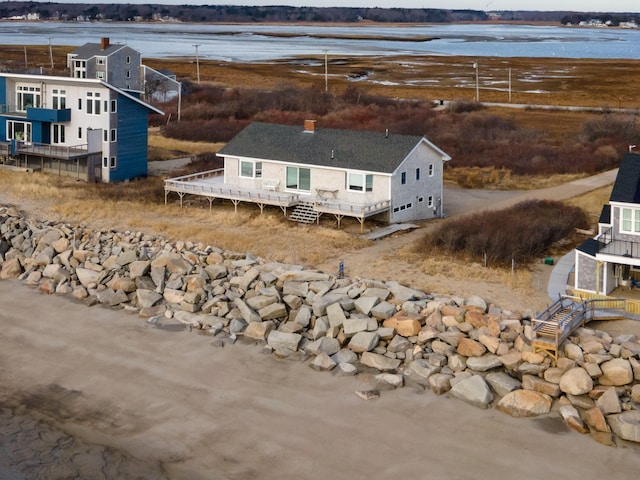 bird's eye view with a water view