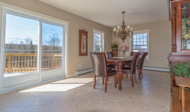 tiled dining room featuring baseboard heating and a chandelier