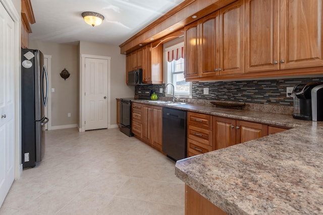 kitchen with light tile patterned floors, sink, backsplash, and black appliances