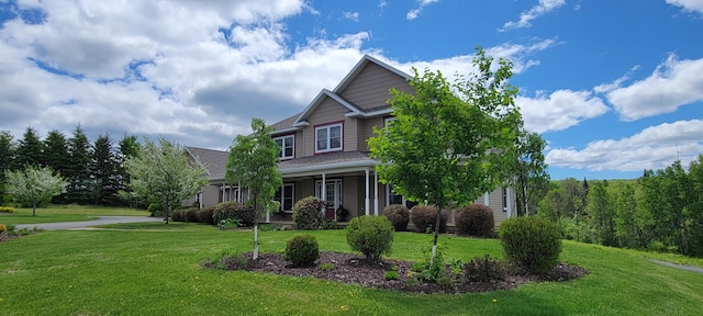 craftsman house with a front yard