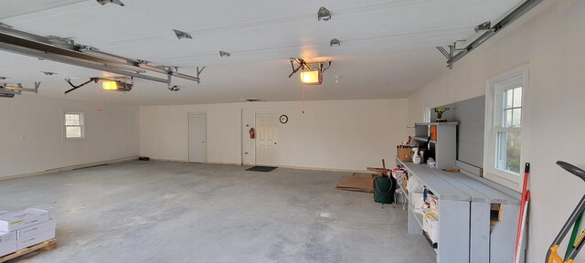 149 Bellevue St, Madawaska, ME 04756 - garage featuring a garage door opener