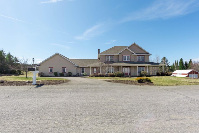 149 Bellevue St, Madawaska, ME 04756 - view of front of house with a front yard and a porch