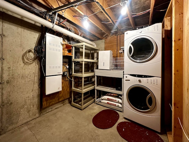 laundry room featuring stacked washer and dryer