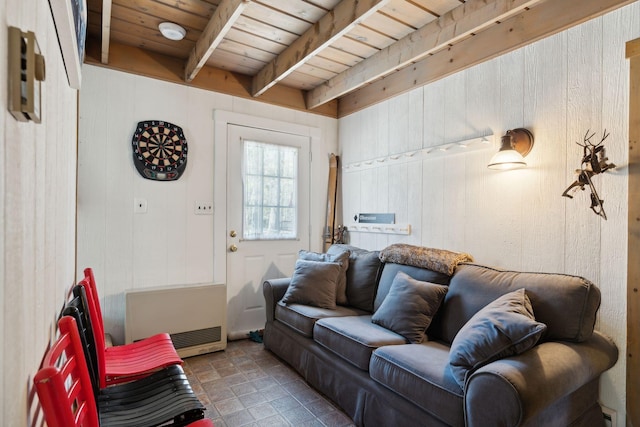 tiled living room featuring wood walls, beamed ceiling, and wooden ceiling