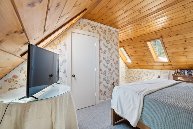 carpeted bedroom with vaulted ceiling with skylight and wood ceiling