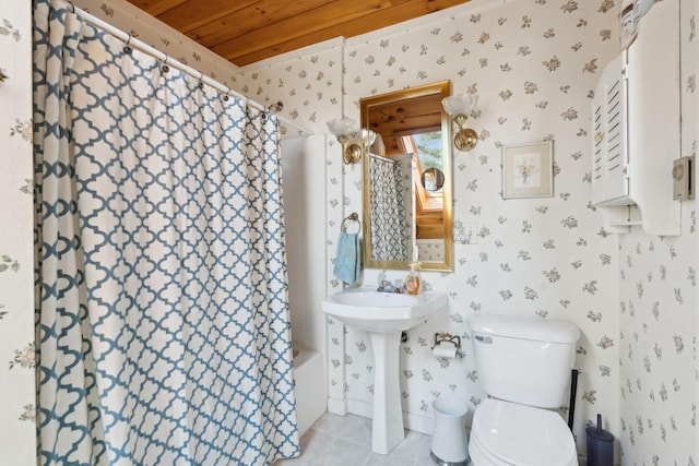 bathroom with wood ceiling, toilet, and tile flooring