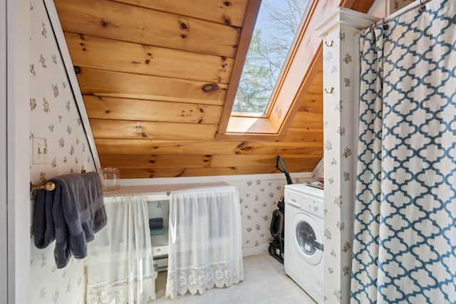 washroom featuring wood ceiling, a skylight, and light tile floors