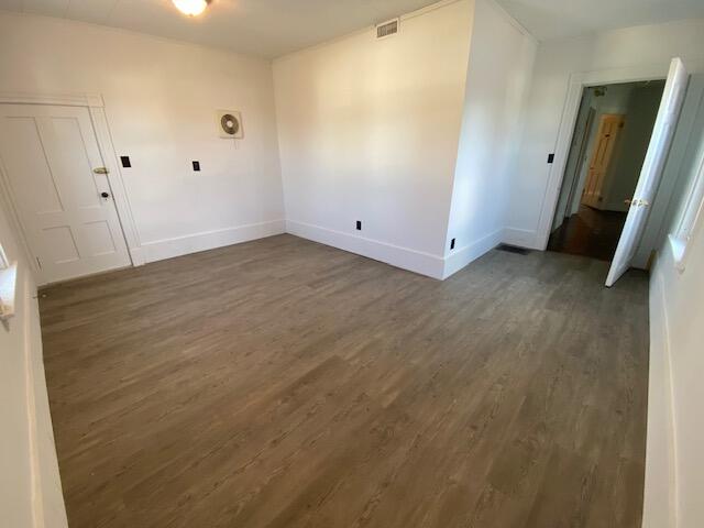 interior space with dark wood-type flooring