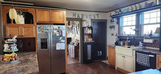 kitchen featuring hanging light fixtures, sink, stainless steel fridge with ice dispenser, dishwasher, and dark hardwood / wood-style flooring