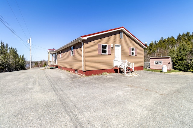 exterior space with a storage unit