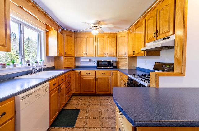 kitchen with white appliances, ceiling fan, tile floors, and sink