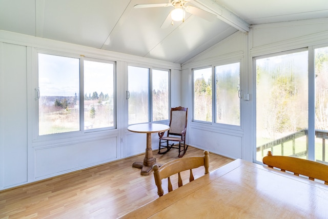 sunroom / solarium with lofted ceiling with beams and ceiling fan