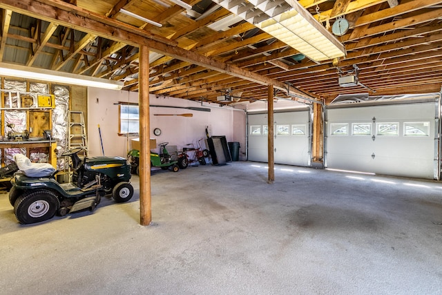 garage featuring a garage door opener