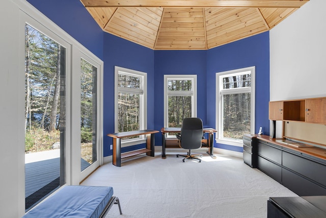 carpeted office space with lofted ceiling and wooden ceiling