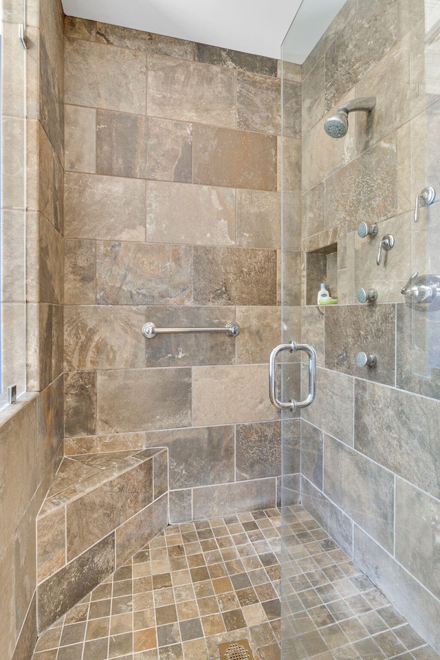 bathroom featuring walk in shower