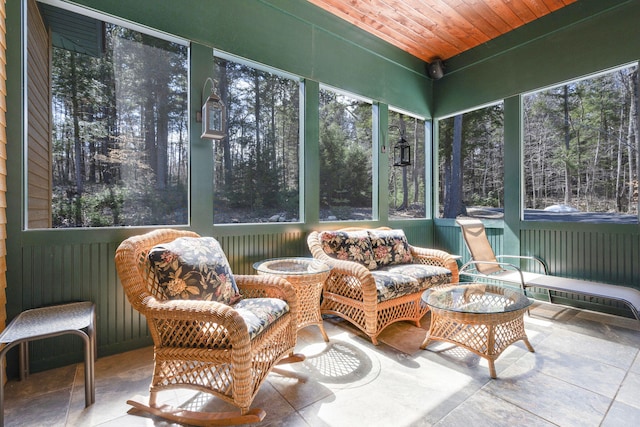 sunroom / solarium with wood ceiling and a wealth of natural light