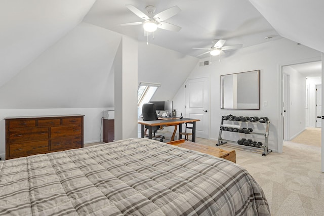 carpeted bedroom featuring vaulted ceiling and ceiling fan