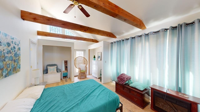 bedroom with lofted ceiling with beams and ceiling fan