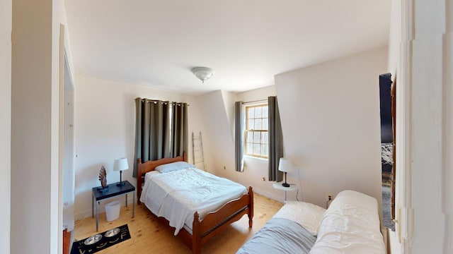 bedroom featuring light hardwood / wood-style flooring