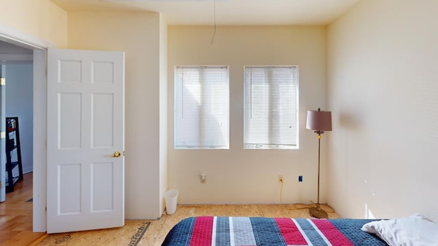 bedroom featuring multiple windows