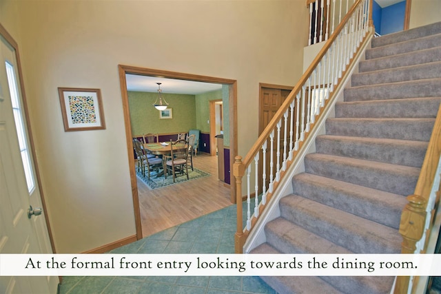 foyer featuring wood-type flooring and a wealth of natural light