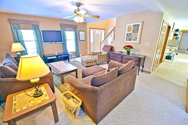 living room featuring ceiling fan