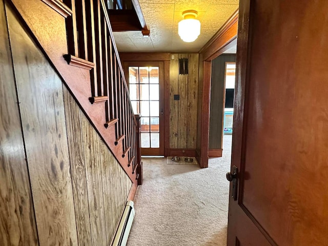 interior space featuring carpet and wooden walls