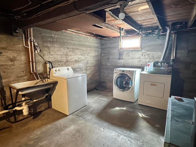 washroom with separate washer and dryer