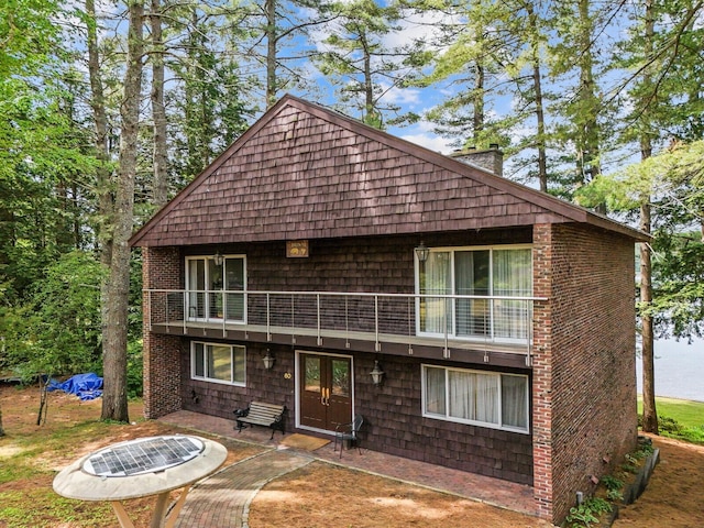 back of property with a patio area