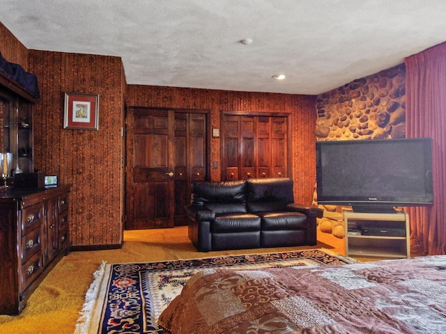 carpeted living room with a textured ceiling