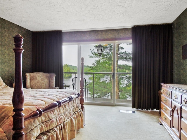 bedroom featuring light carpet and multiple windows