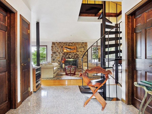 entryway featuring a fireplace