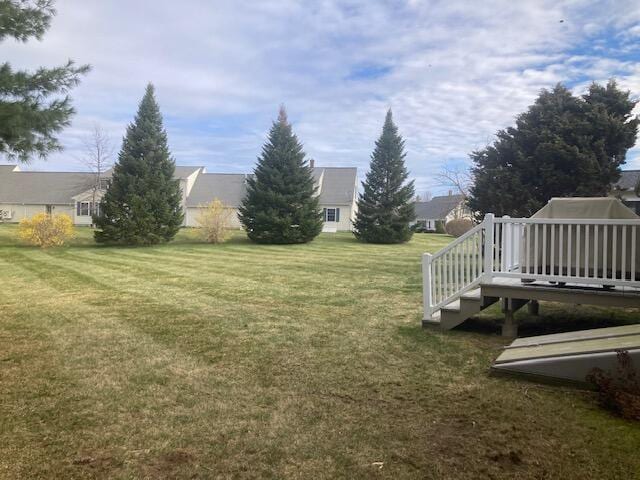 view of yard featuring a deck