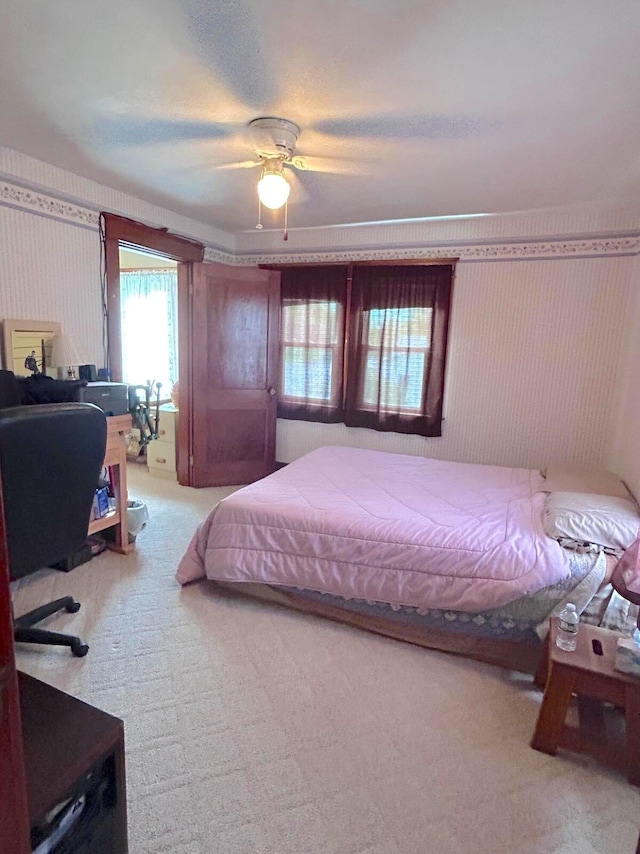 bedroom with carpet floors and ceiling fan